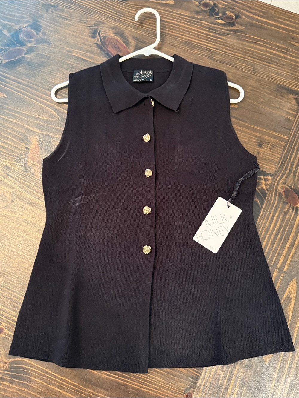 Sleeveless Black Button-Front Top